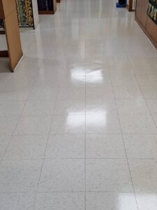 Waxed commercial store white VCT 12x12 inch tile floor